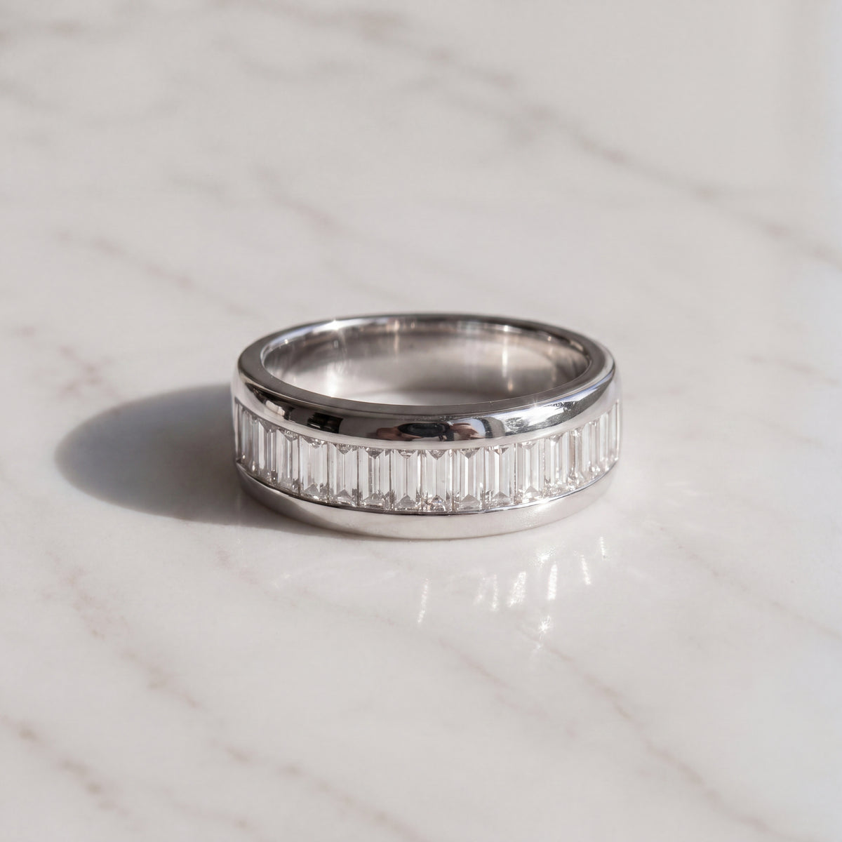 Platinum band channel-set with a row of baguette diamonds