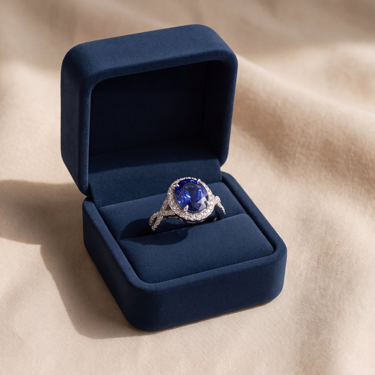 3.25 ct Oval Tanzanite and Diamond Halo Cocktail Ring in 18K White Gold