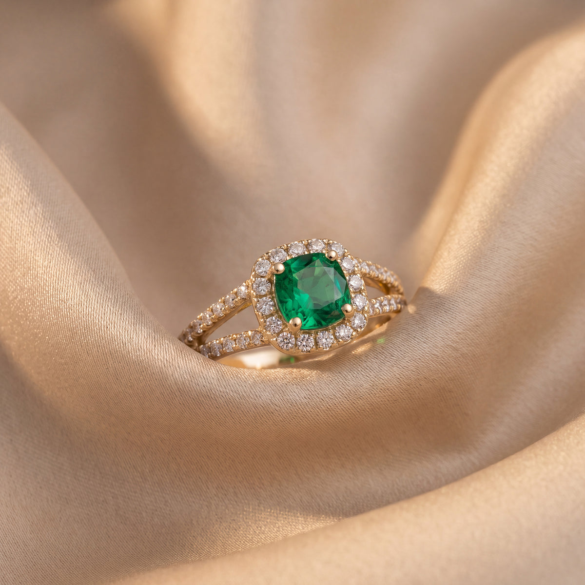 0.60 ct Emerald and Diamond Split Shank Halo Engagement Ring in 14K Yellow Gold