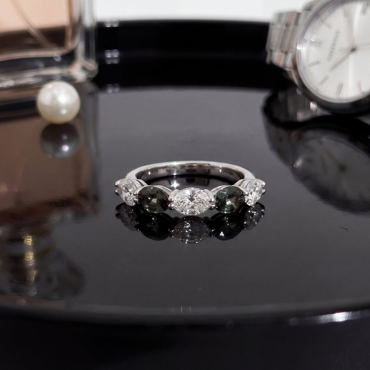 White gold five-stone band with oval alexandrite and diamonds alternating