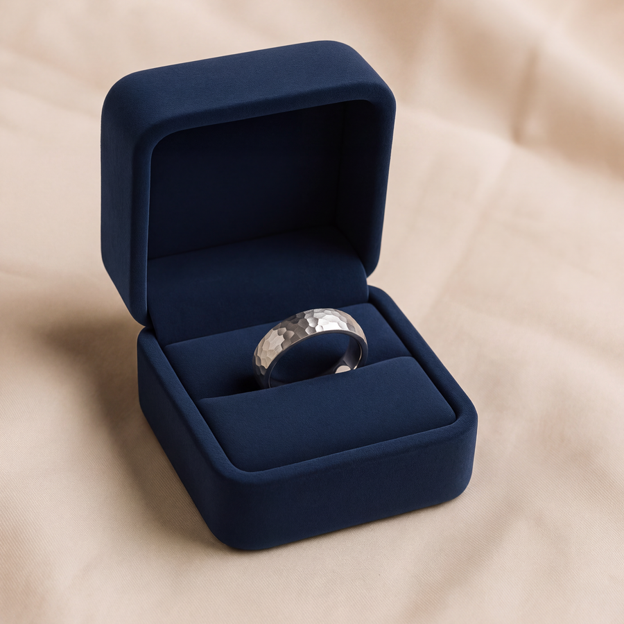 Hammered-finish 14K white gold band ring with a faceted, textured surface