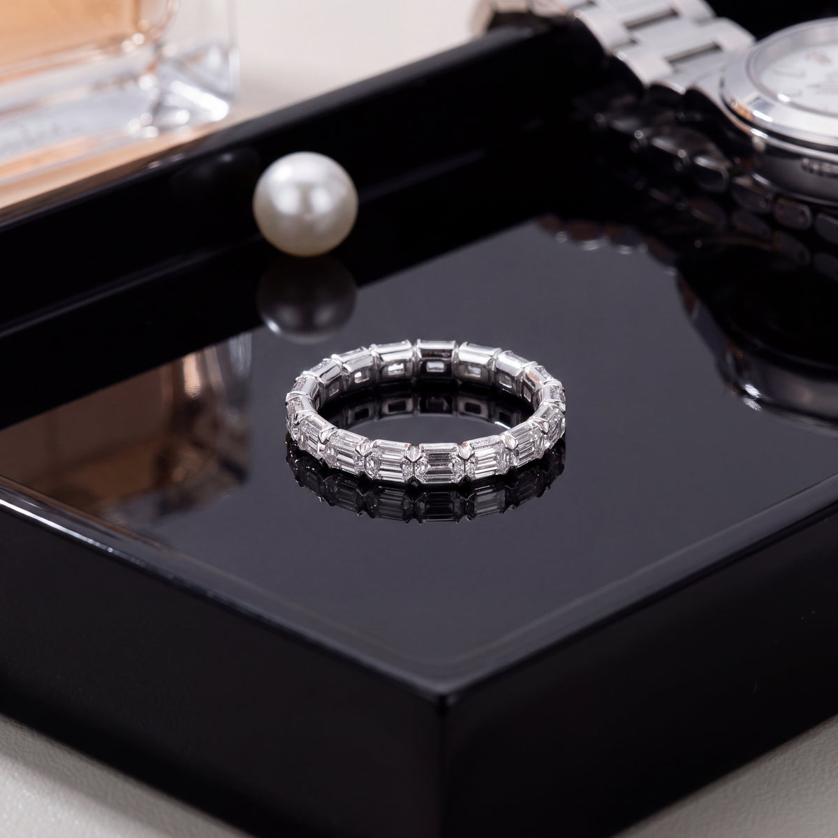 Eternity ring in white gold set all the way around with emerald-cut diamonds