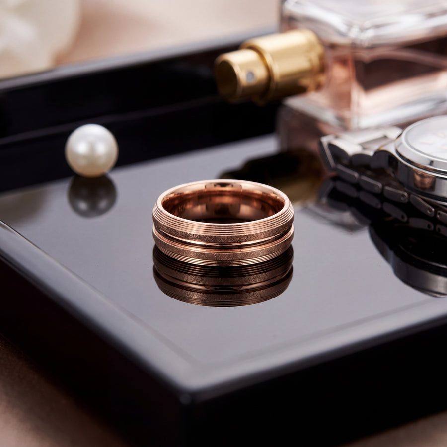 14K rose gold wedding band with a brushed textured finish and a polished center groove