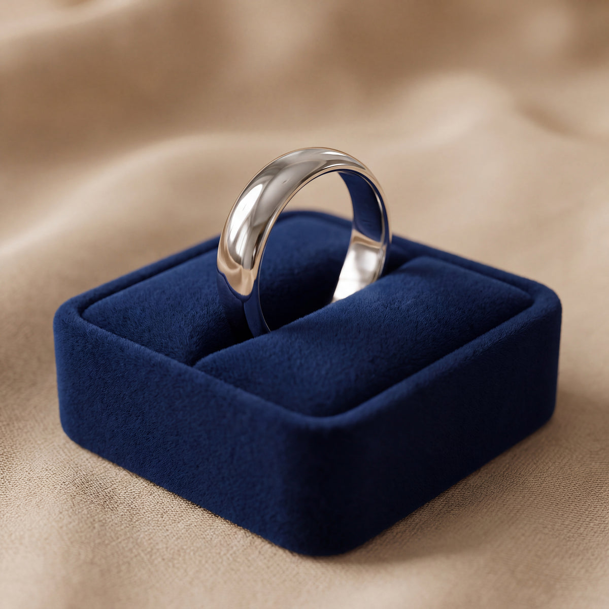 Classic domed wedding band in polished 14K white gold
