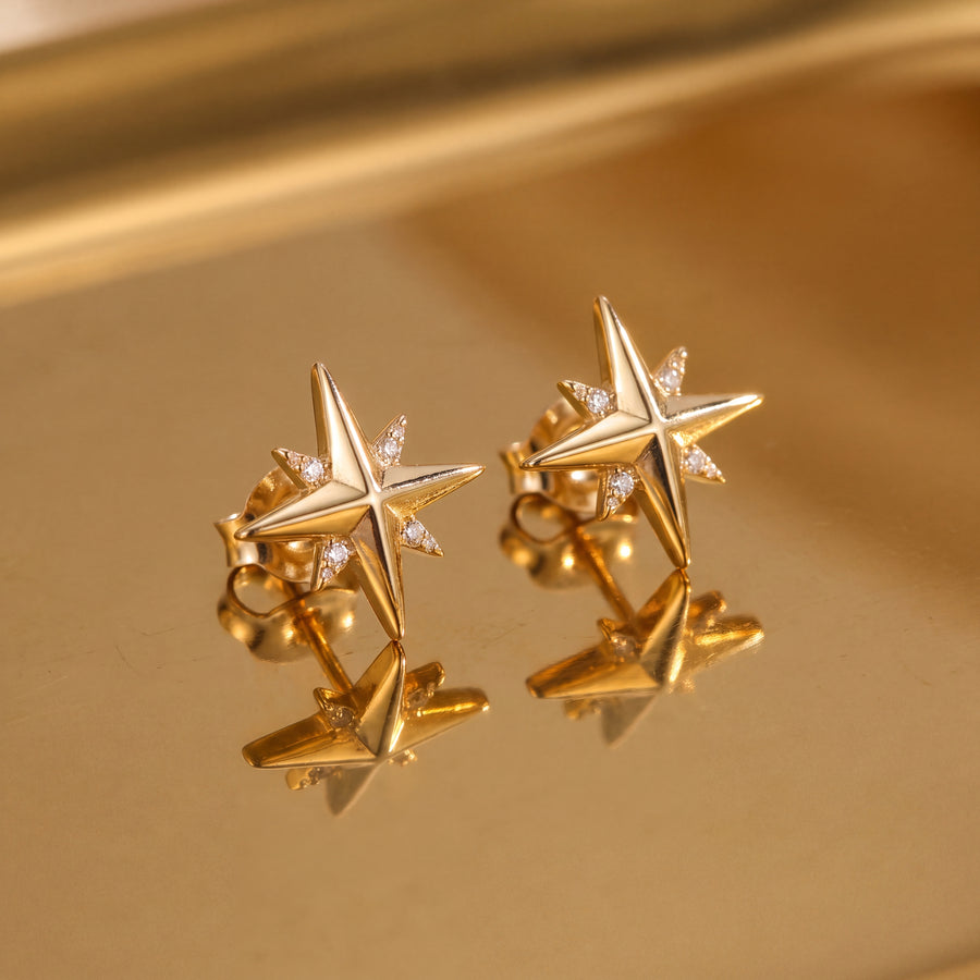 Pair of yellow gold four-point star stud earrings