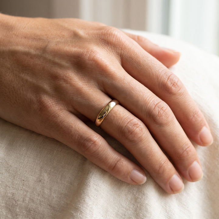 Classic Domed 4mm Band Ring in 14K Yellow Gold, worn