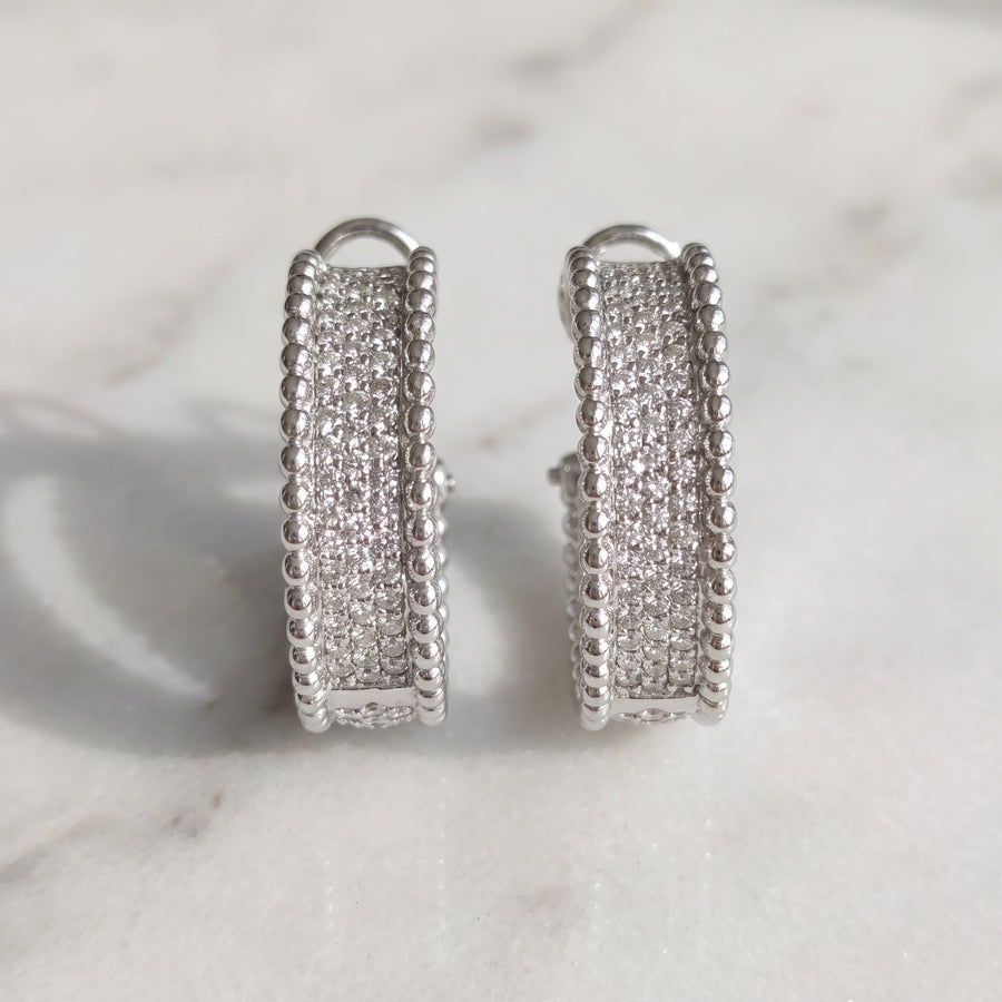 White gold hoop earrings fully pavé-set with diamonds between beaded edges