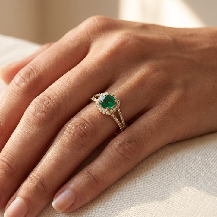 0.60 ct Emerald and Diamond Split Shank Halo Engagement Ring in 14K Yellow Gold, worn