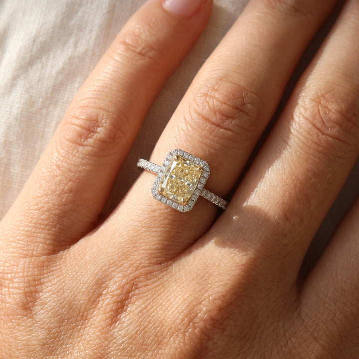 1.02 ct Fancy Yellow Diamond Halo Ring in 14K White Gold, worn