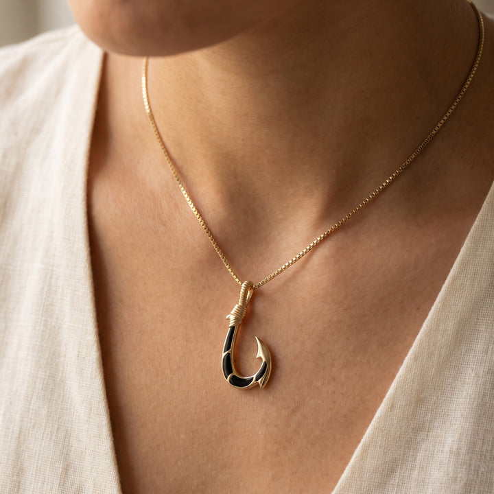 Black Onyx Inlay Fish Hook Pendant Necklace in 14K Yellow Gold, worn