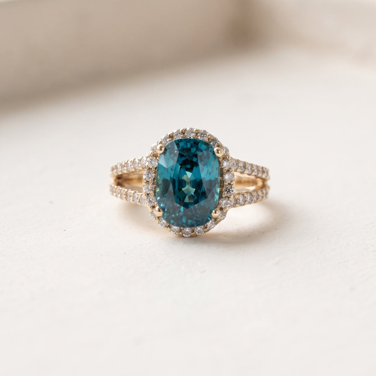 3.54 ct Oval Blue Zircon and Diamond Split Shank Halo Ring in 14K Yellow Gold