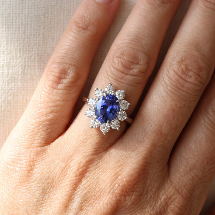 2.57 ct Oval Tanzanite and Diamond Floral Halo Cocktail Ring in 14K White Gold, worn