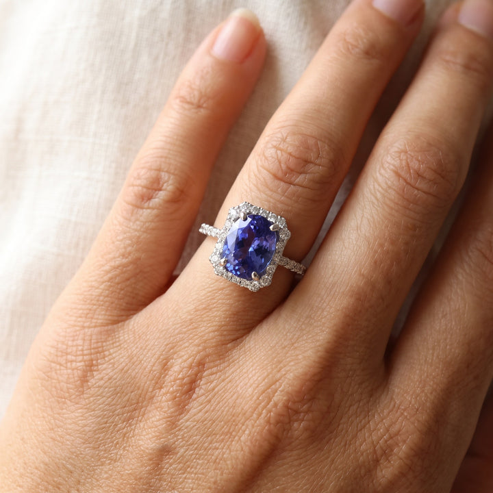 2.71 ct Oval Tanzanite and Diamond Halo Cocktail Ring in 14K White Gold, worn