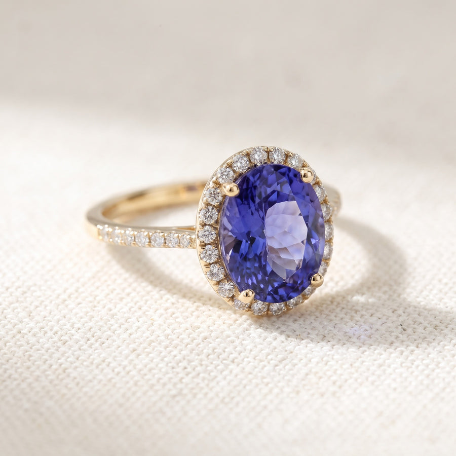 Oval Tanzanite Halo Cocktail Ring in Yellow Gold