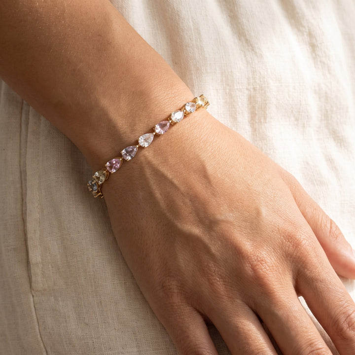 11.58 ct Pear-Shape Multi-Color Sapphire Tennis Bracelet in 14K Yellow Gold, worn