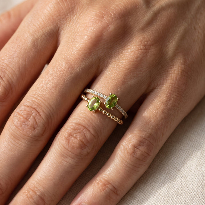 1.06 ct Oval Peridot and Diamond Multi-Stone Ring in 14K Yellow Gold, worn