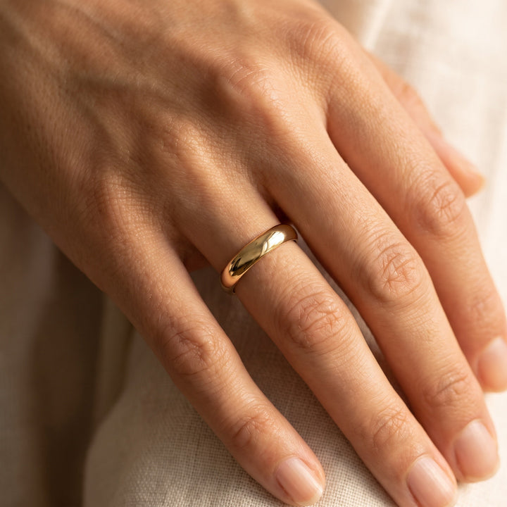 Polished 4mm Domed Band Ring in 14K Yellow Gold, worn