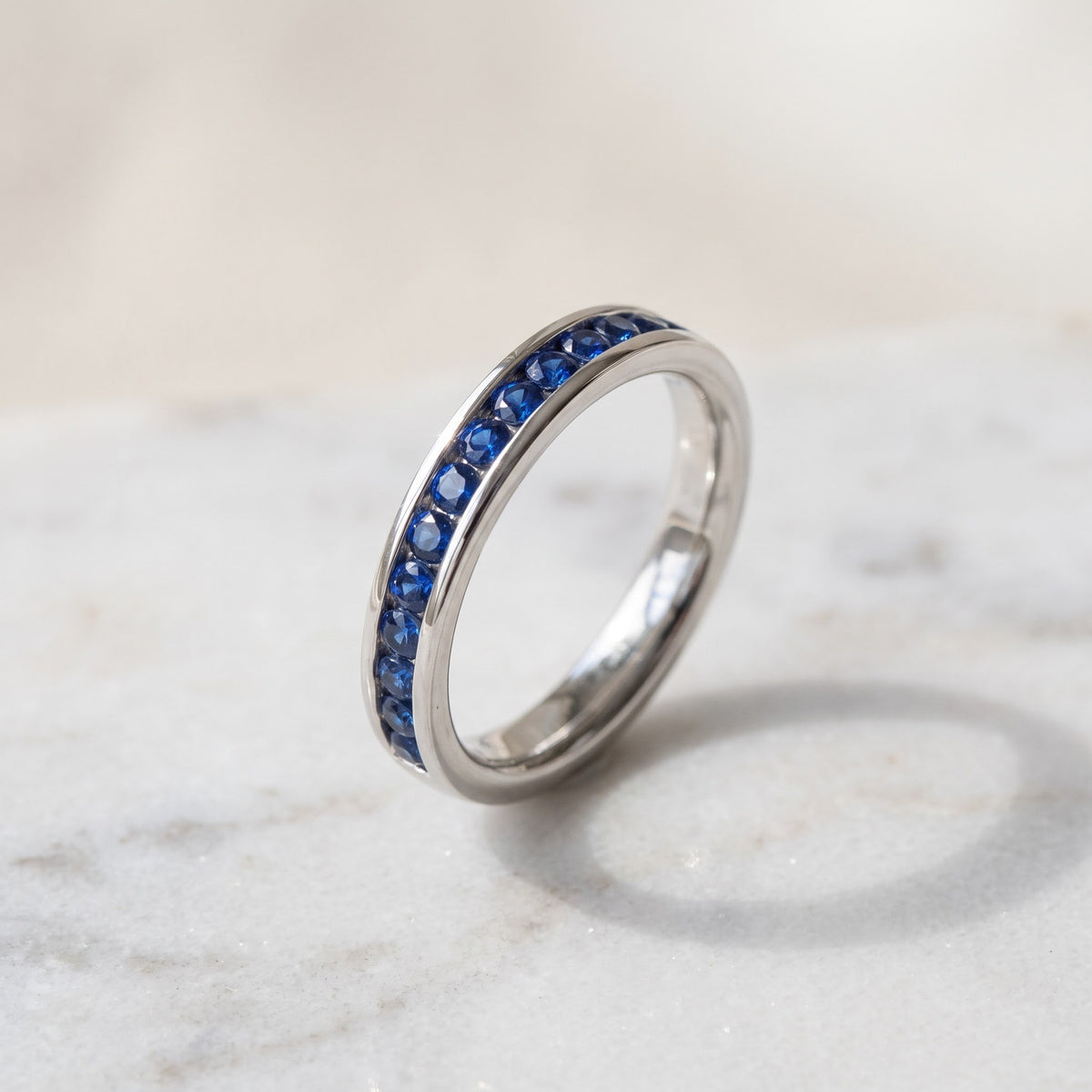 Royal Blue Sapphire Channel Set Band in White Gold