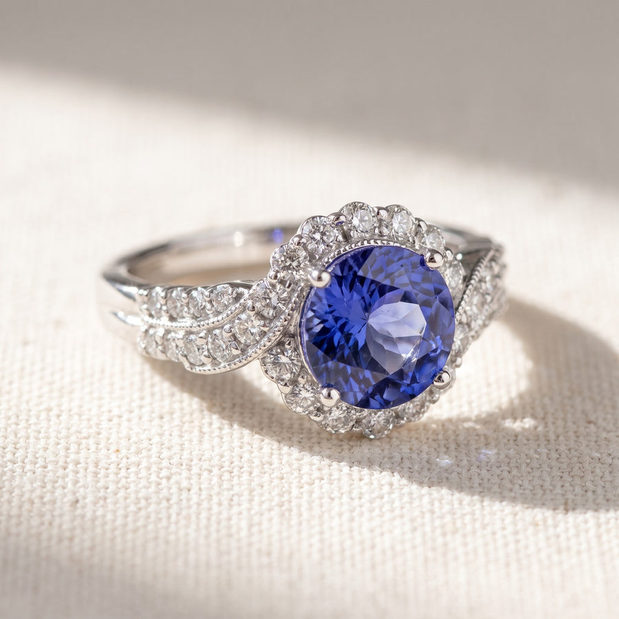 Tanzanite Twist Halo Cocktail Ring in White Gold