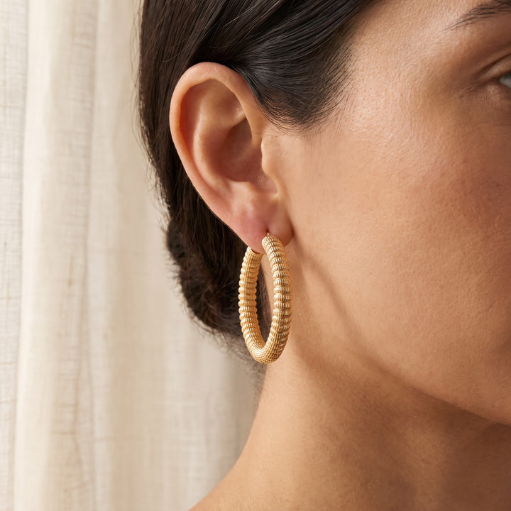 Textured Ribbed Hoop Earrings in 14K Yellow Gold, worn