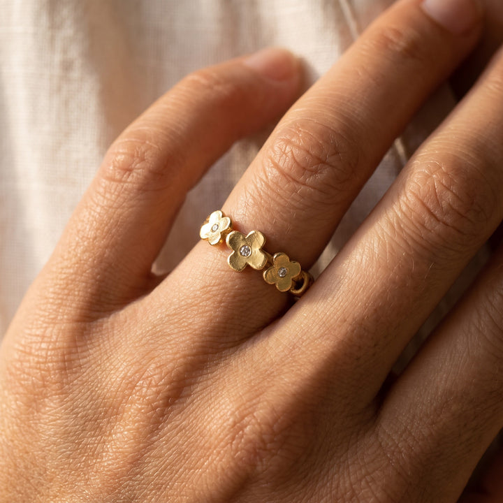 Three-Flower Diamond Stackable Ring in 18K Yellow Gold, worn