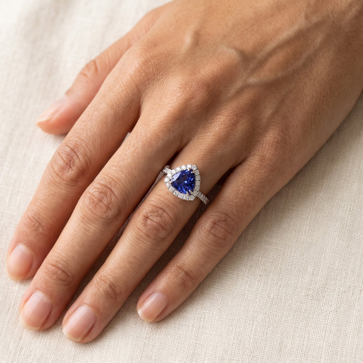 2.52 ct Trillion Cut Tanzanite and Diamond Halo Cocktail Ring in 14K White Gold, worn