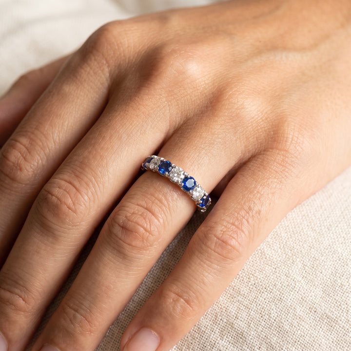 0.87 ct Alternating Royal Blue Sapphire and Diamond Band in 14K White Gold, worn