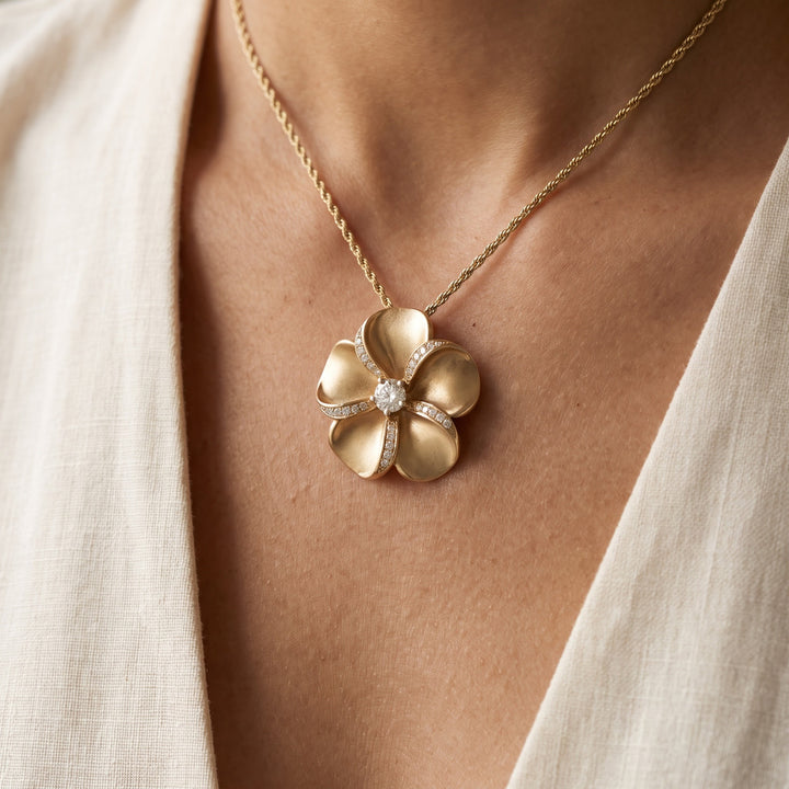 0.29 ct Diamond Plumeria Pendant in 14K Yellow Gold, worn