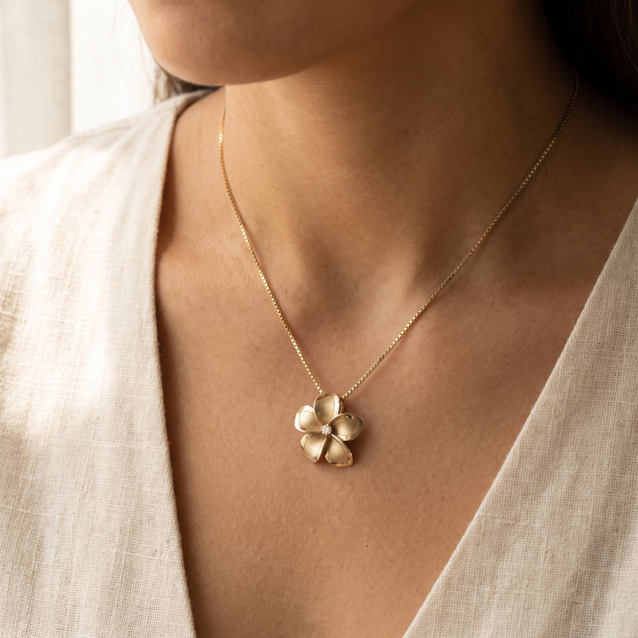 0.05 ct Diamond Flower Pendant Necklace in 14K Yellow Gold, worn