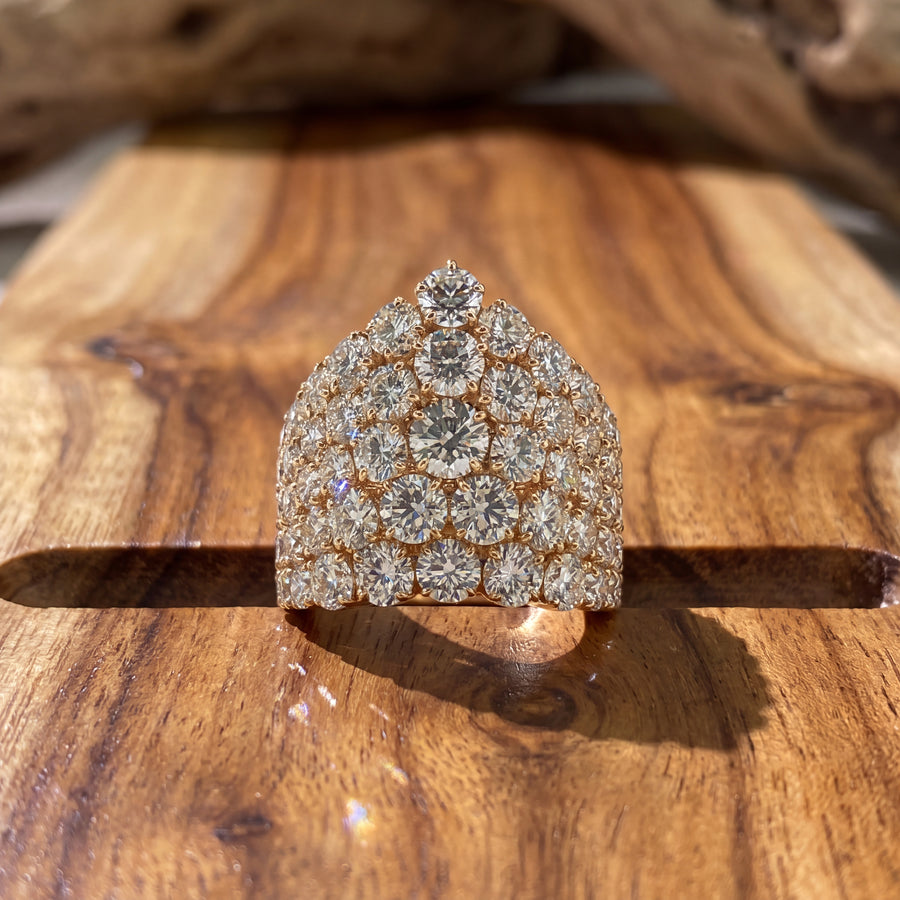Domed cocktail ring covered in round brilliant diamonds, rising to a point at the top