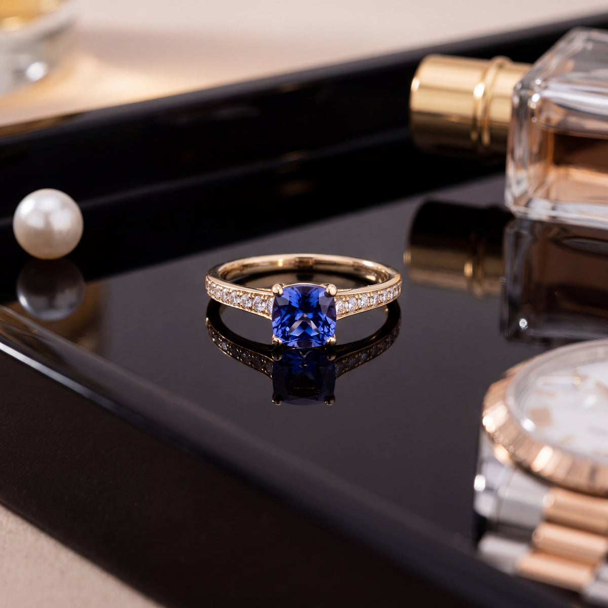 Cushion-cut tanzanite on a yellow gold band lined with diamonds