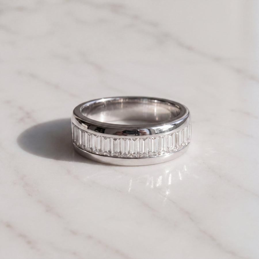 Platinum band channel-set with a row of baguette diamonds