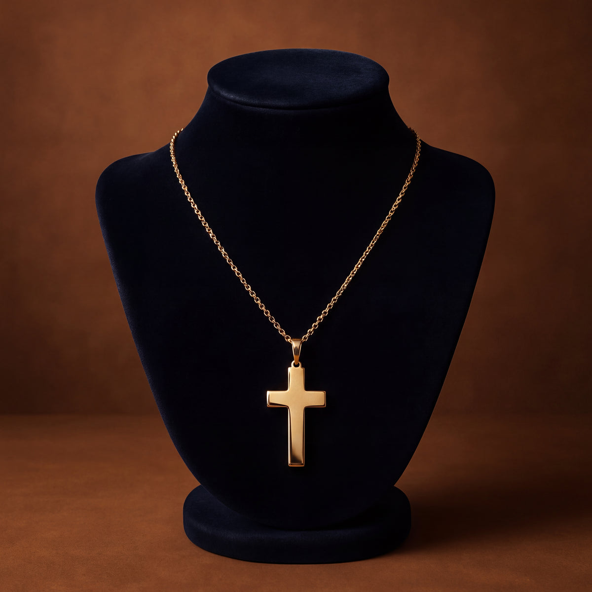 Smooth polished yellow gold cross pendant on a fine chain