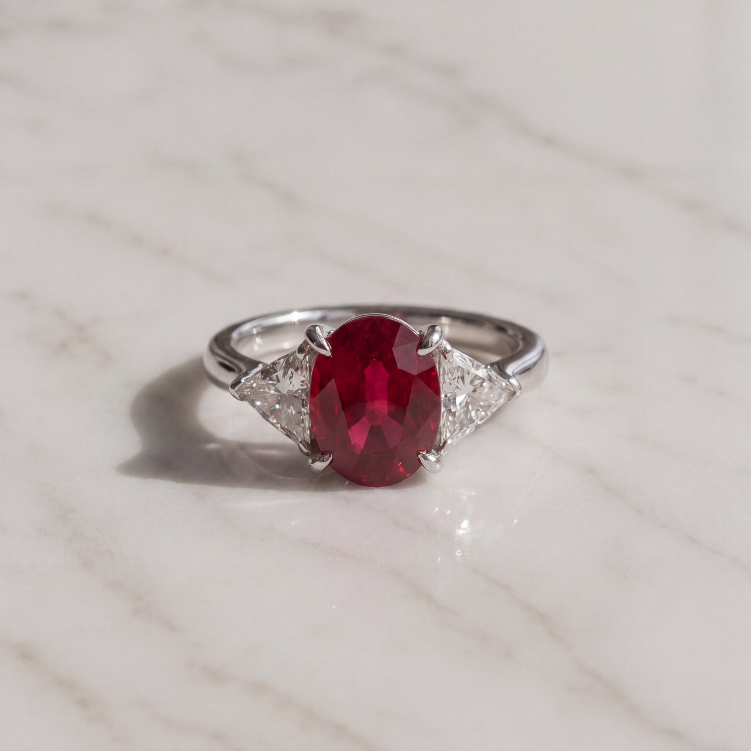 Oval Pigeon Blood Ruby Three-Stone Ring in White Gold
