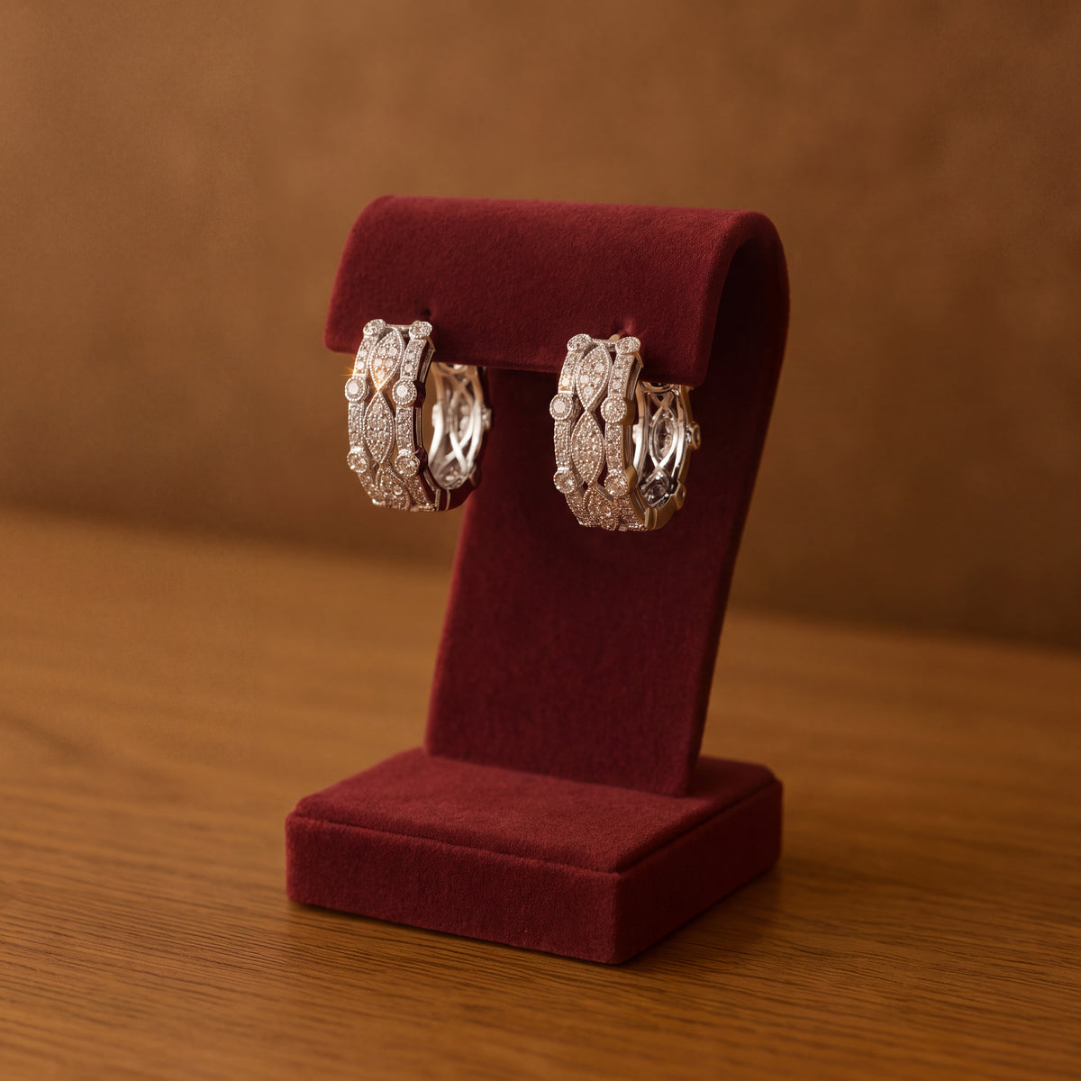 Wide openwork white gold hoop earrings set with diamonds