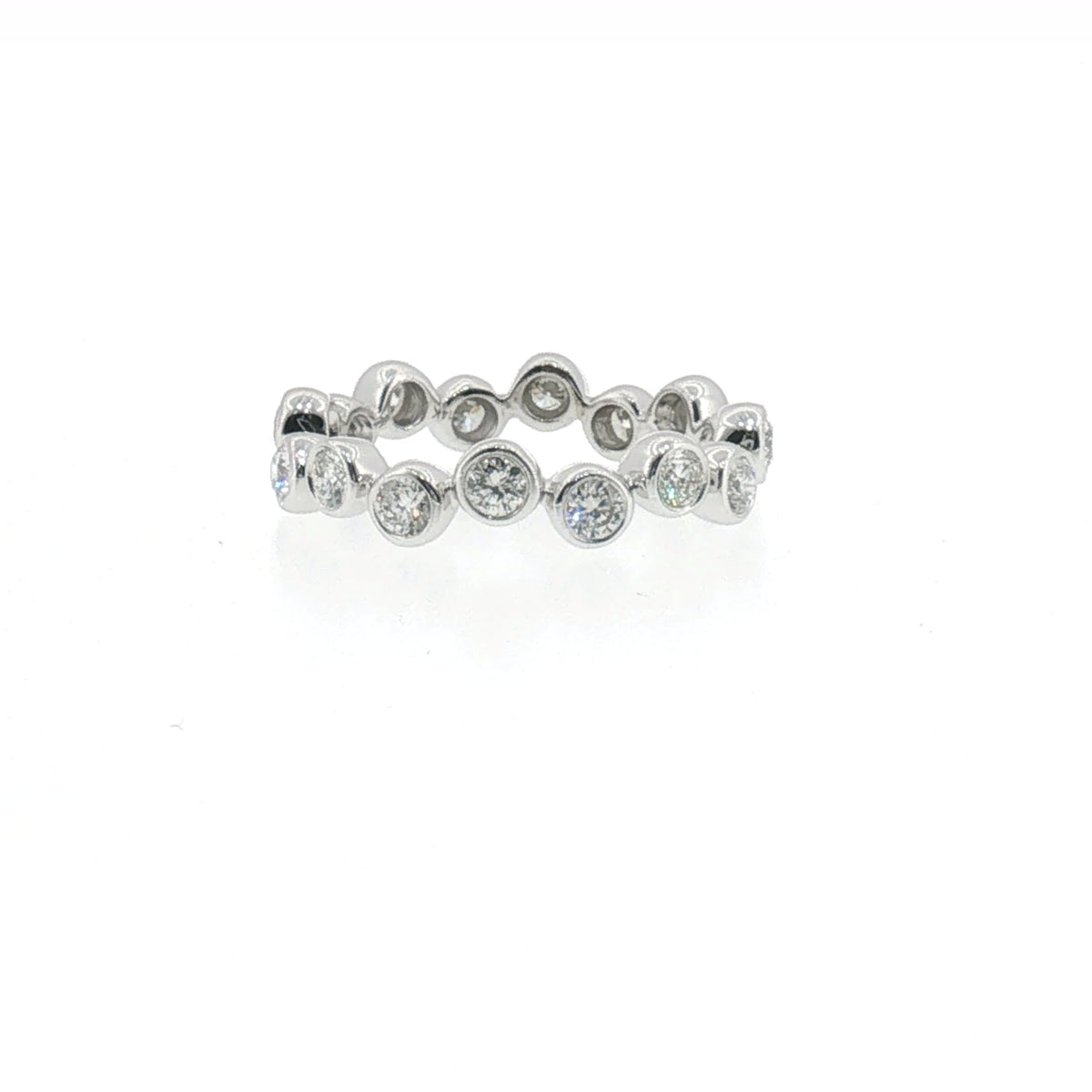 Bezel-set diamond eternity ring in white gold