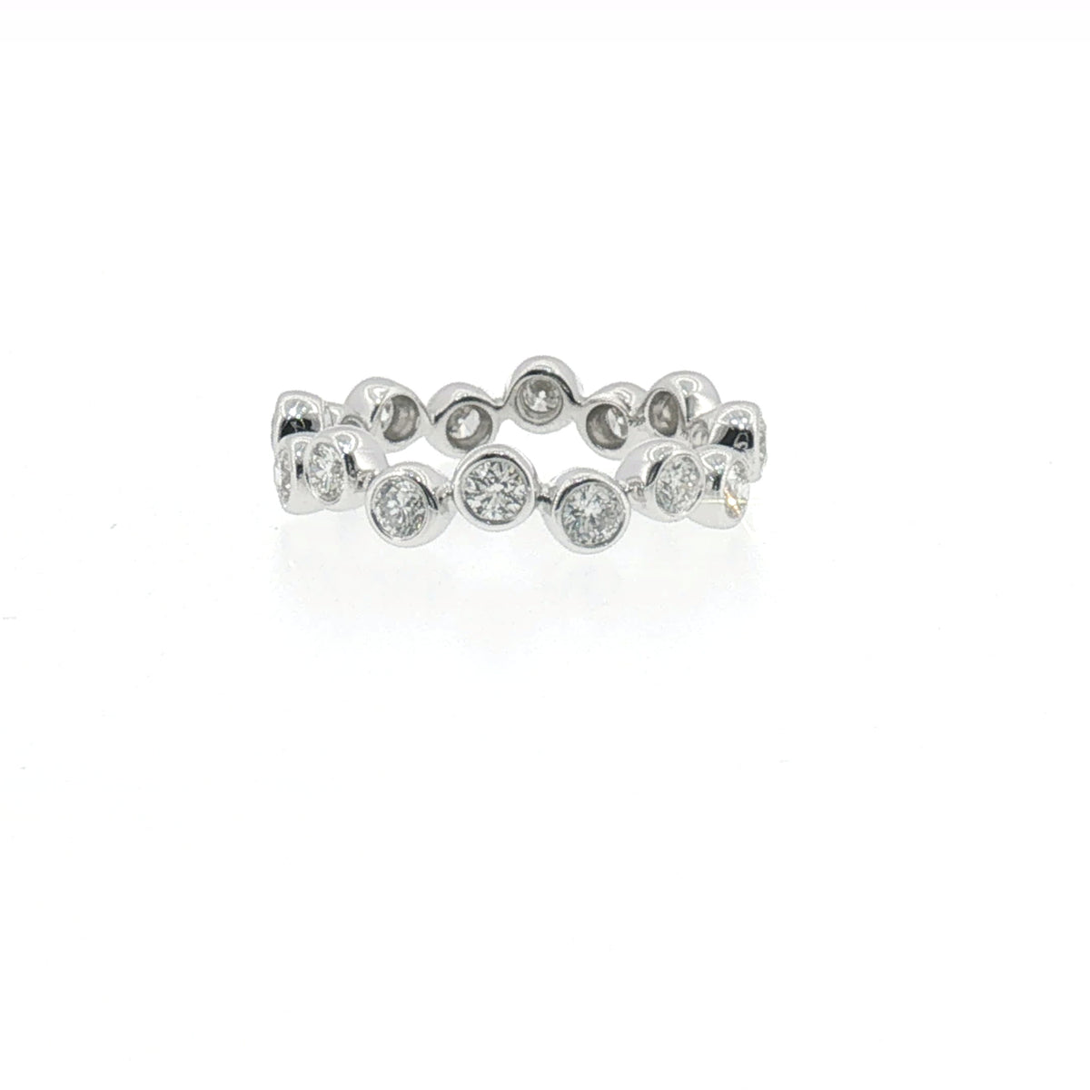 Bezel-set diamond eternity ring in white gold