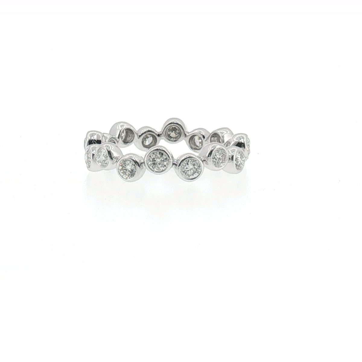 Bezel-set diamond eternity ring in white gold