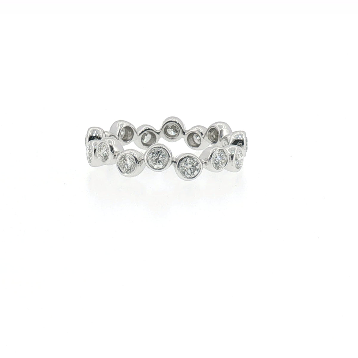 Bezel-set diamond eternity ring in white gold