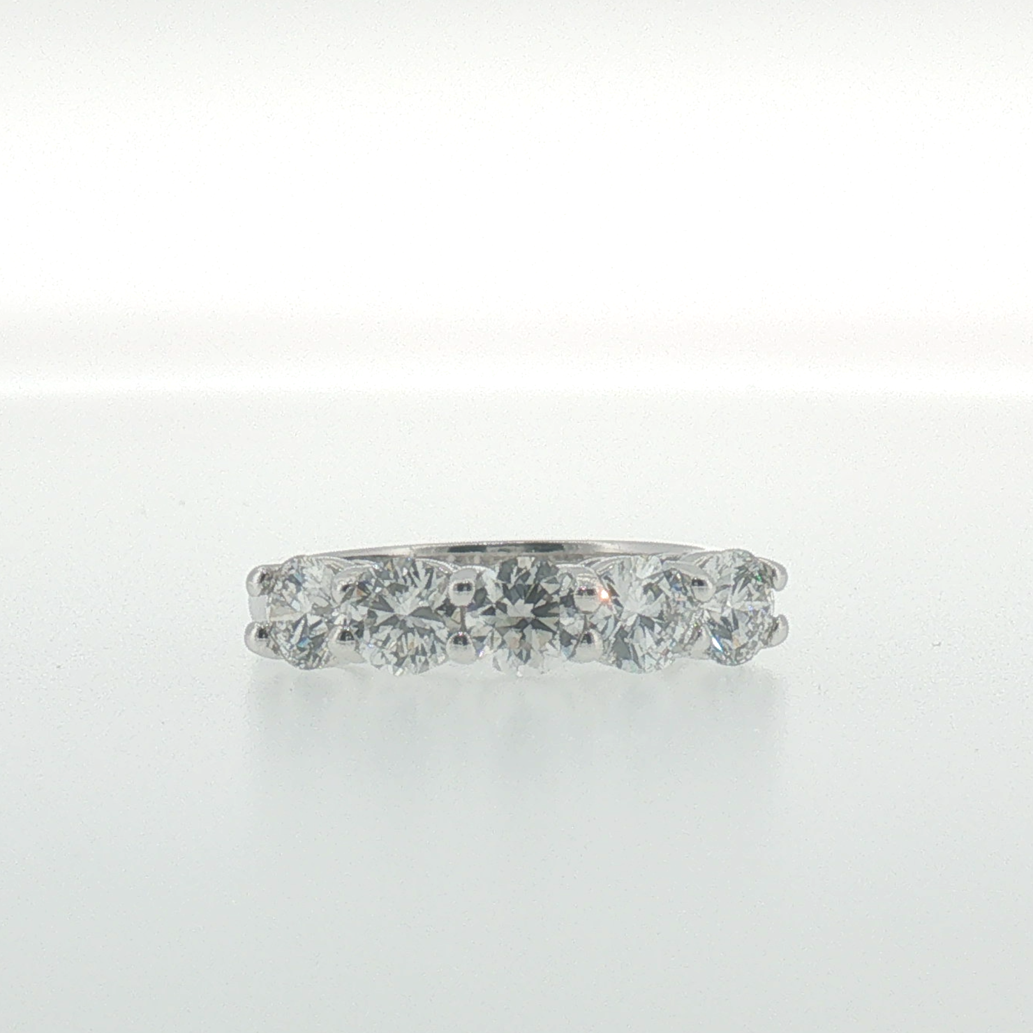 White Gold Diamond Shared Prong Band