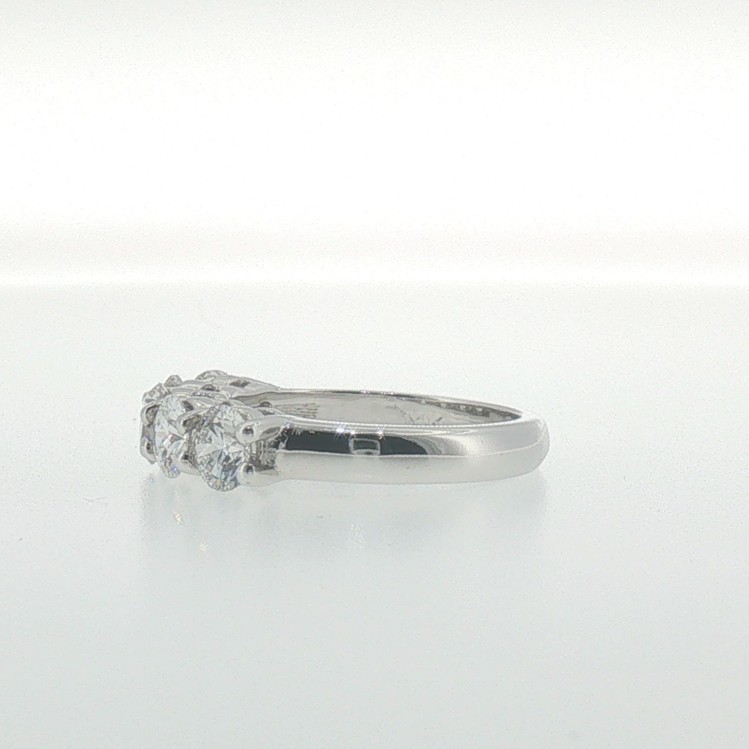 White Gold Diamond Shared Prong Band