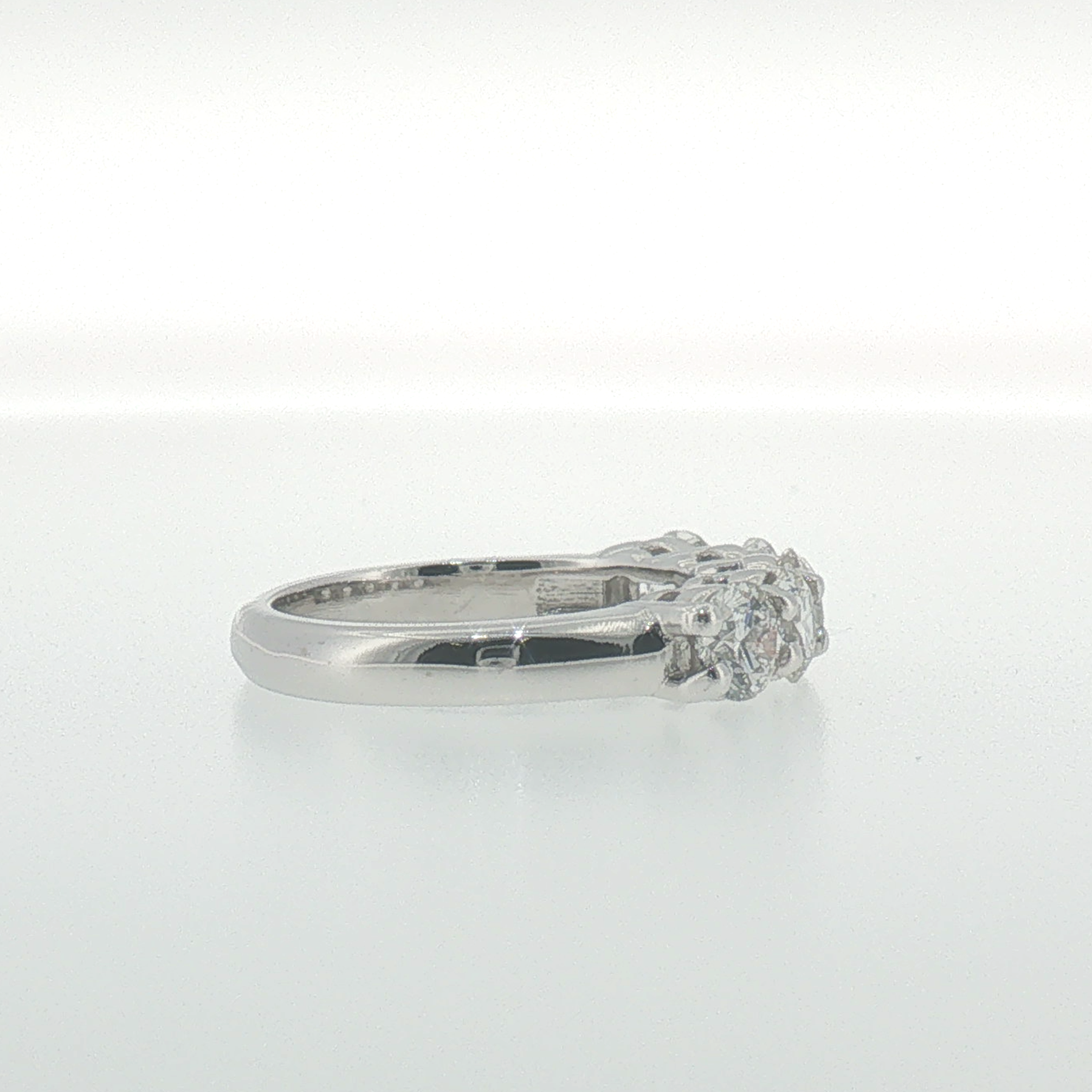 White Gold Diamond Shared Prong Band
