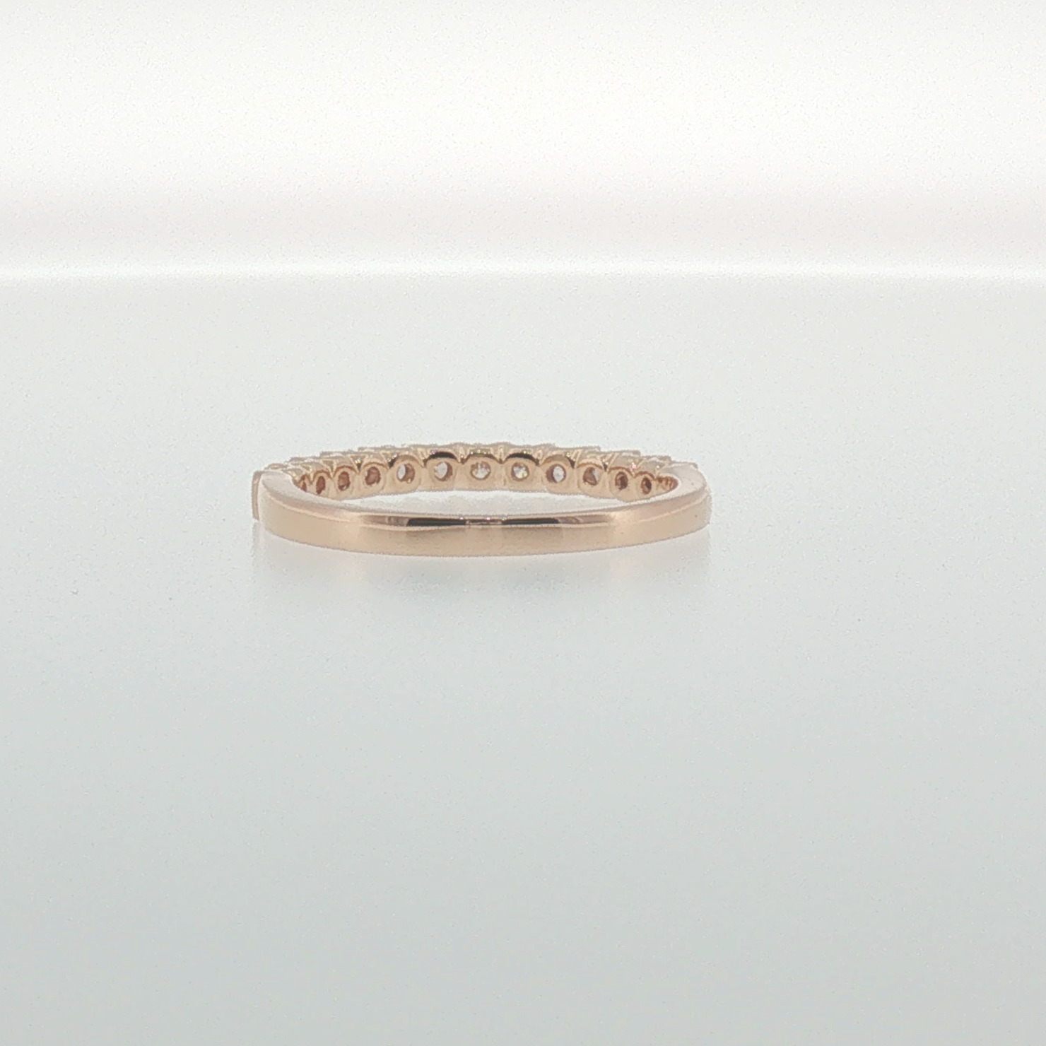 Diamond Shared Prong Band in Rose Gold