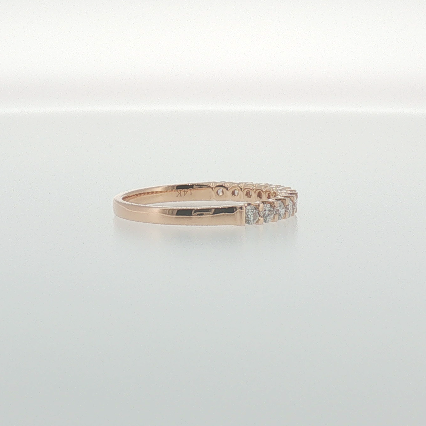 Diamond Shared Prong Band in Rose Gold