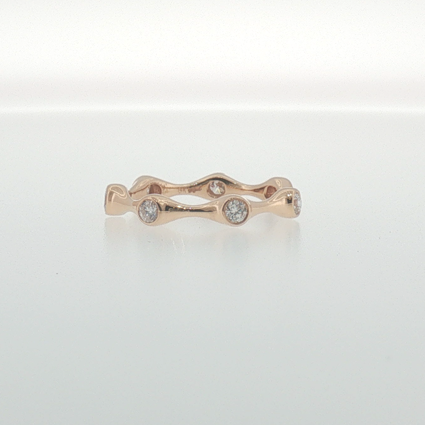 Bezel-Set Diamond Wavy Eternity Ring in Rose Gold