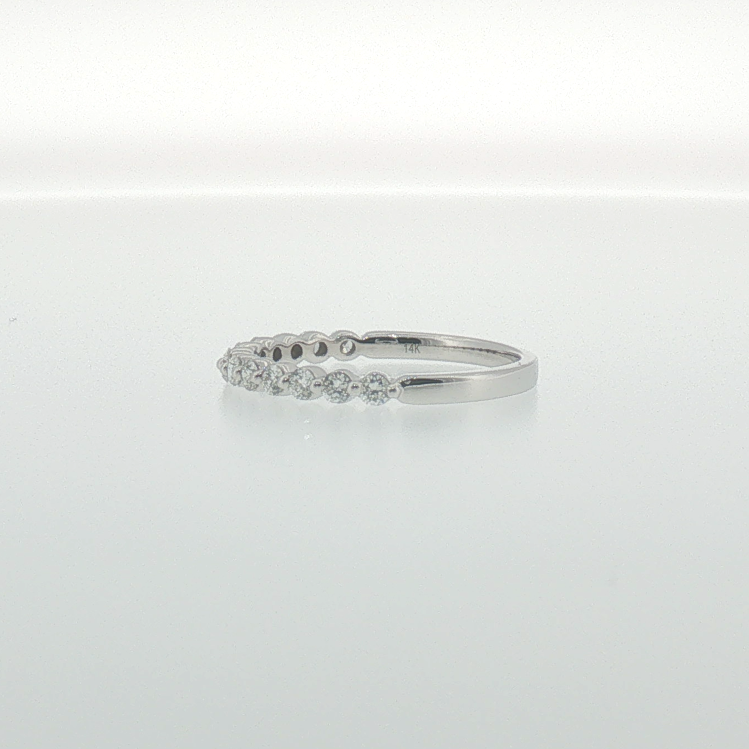 Diamond Single Prong Band in White Gold
