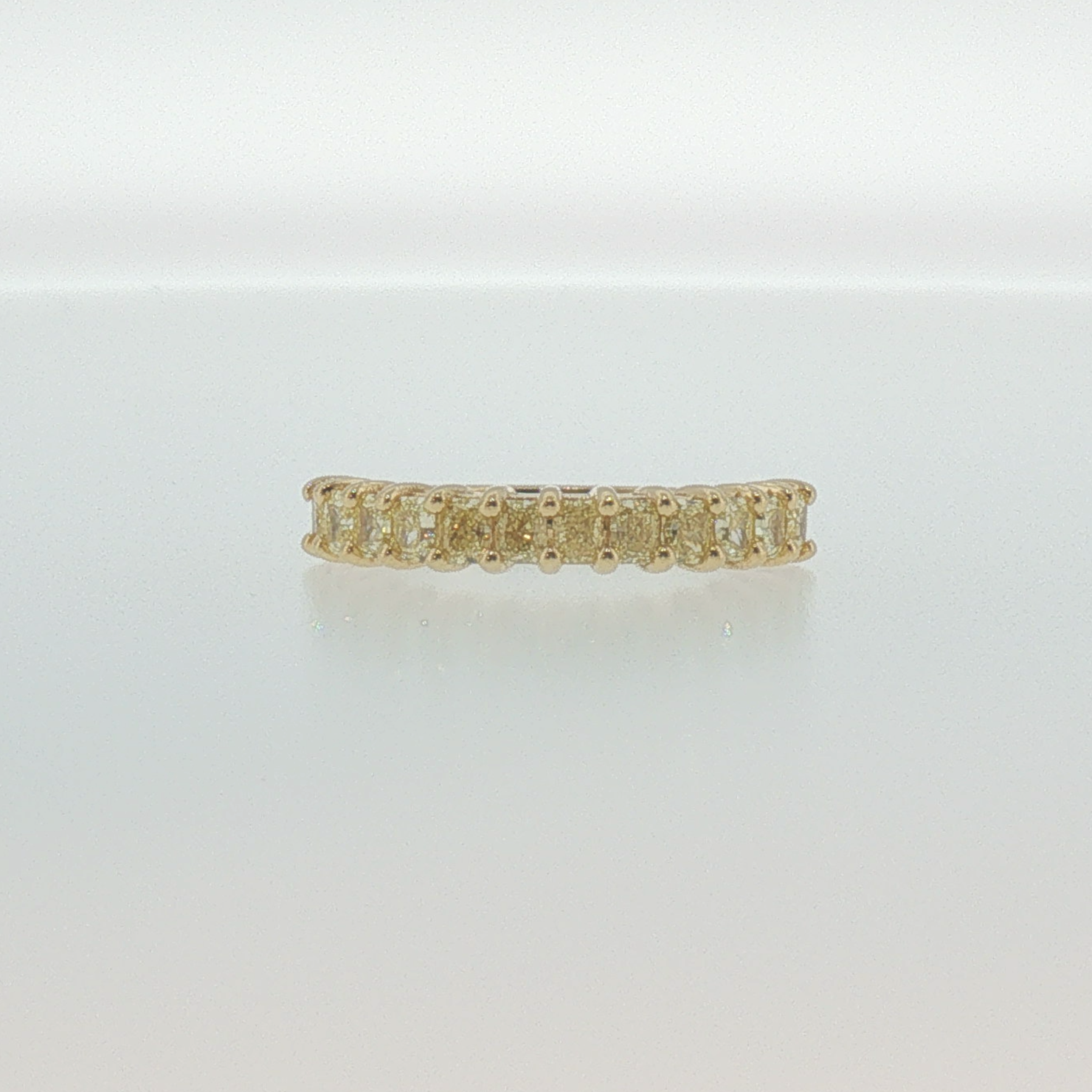 Fancy Yellow Diamond Shared Prong Band in Yellow Gold