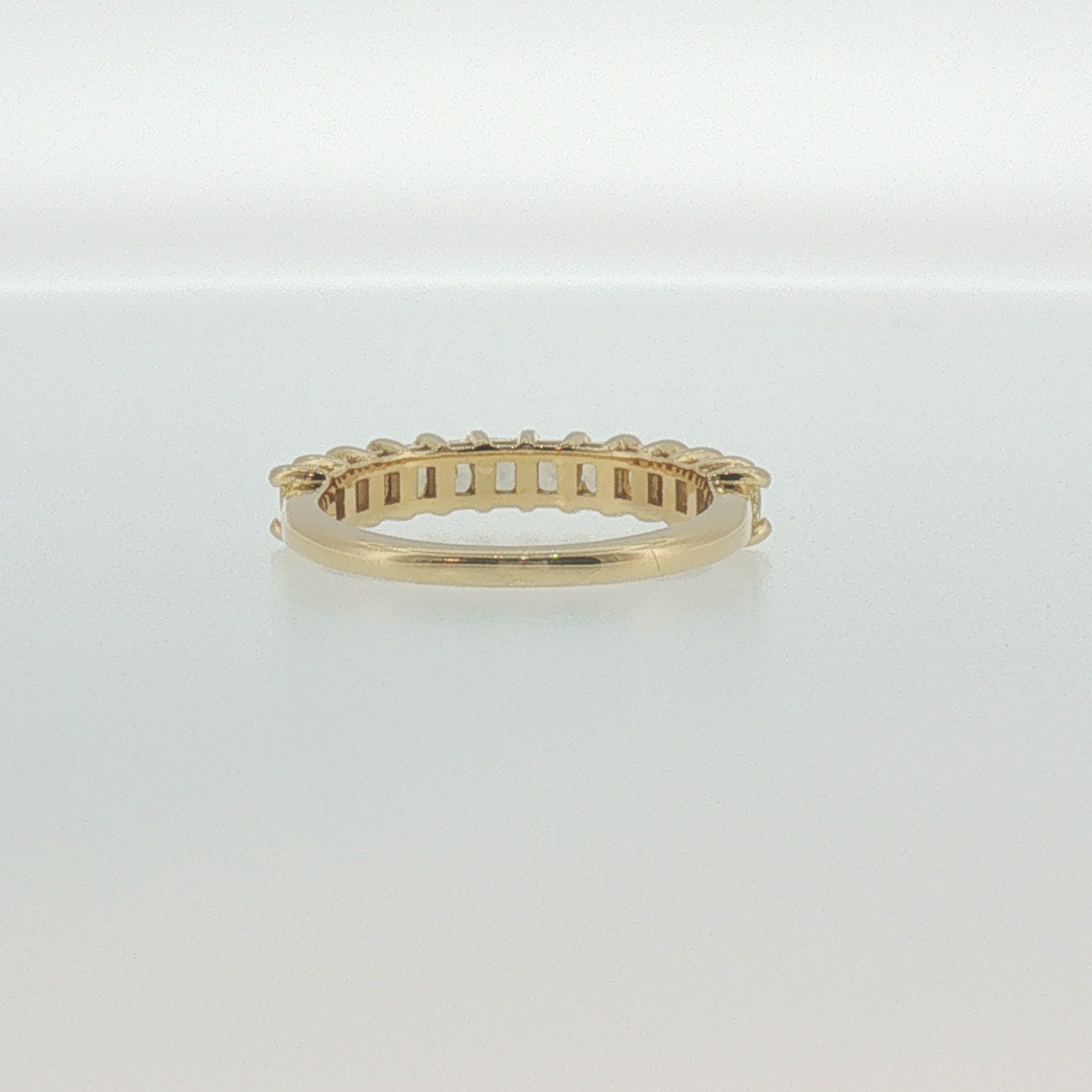 Fancy Yellow Diamond Shared Prong Band in Yellow Gold