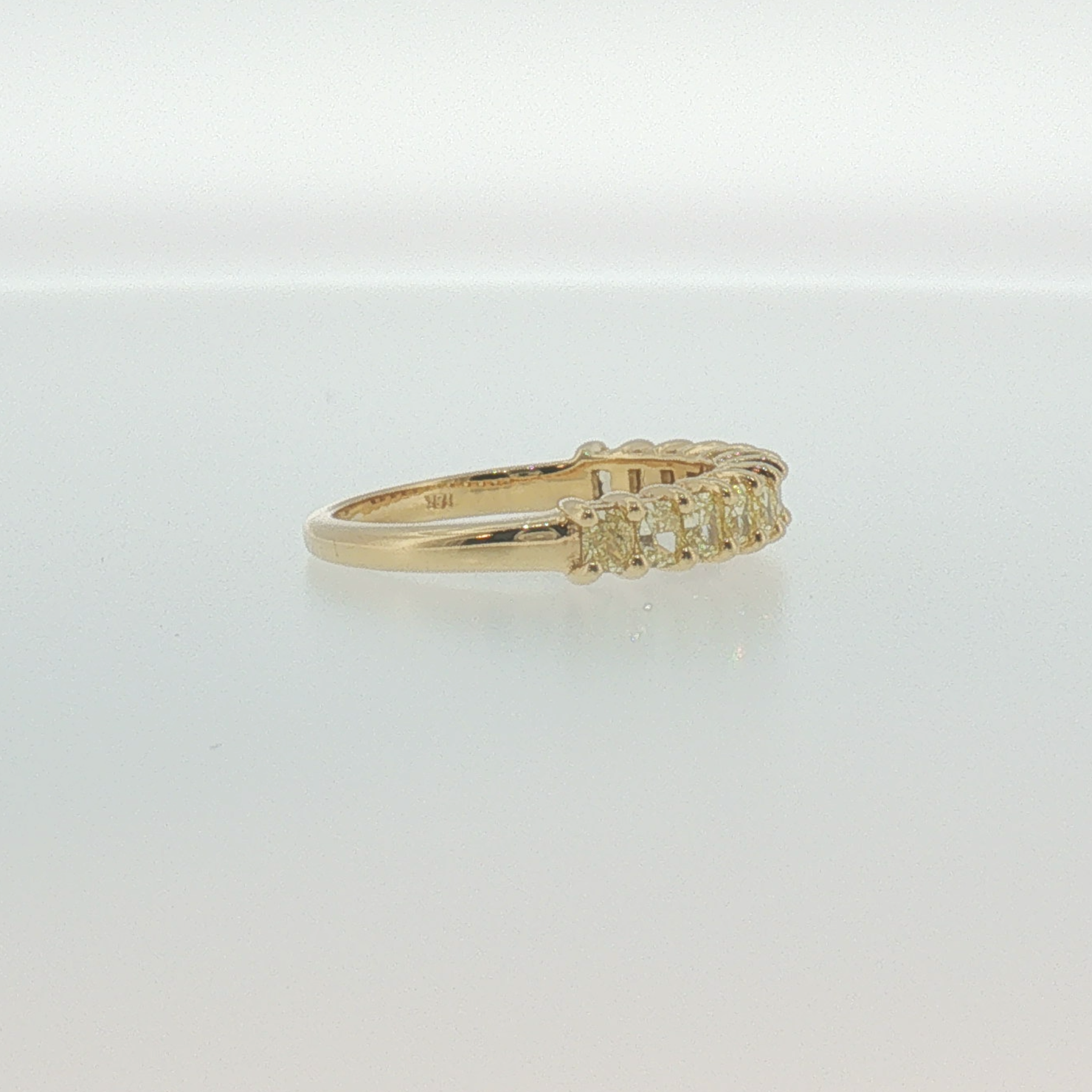 Fancy Yellow Diamond Shared Prong Band in Yellow Gold