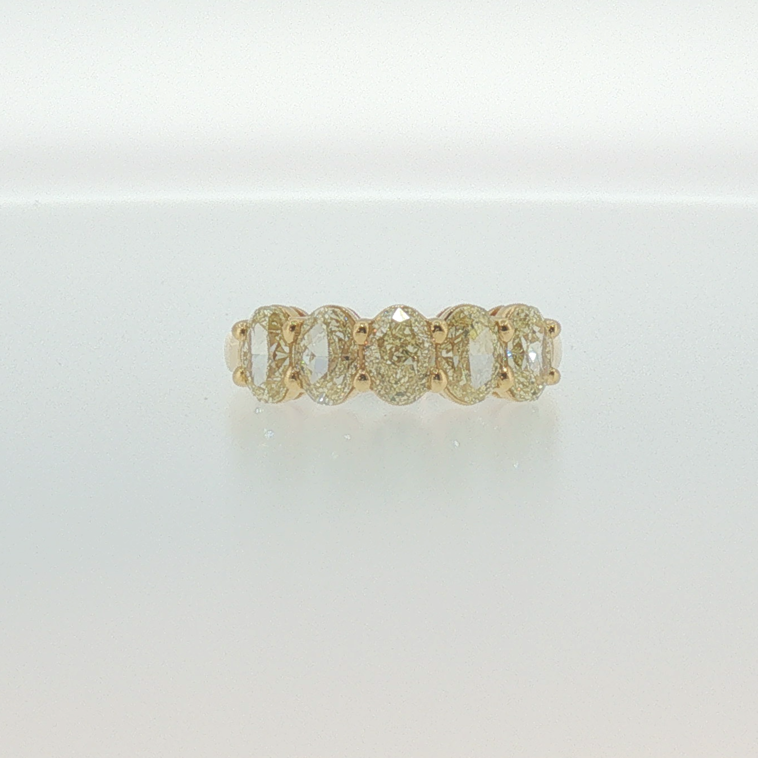Fancy Yellow Oval Diamond Five-Stone Ring in Yellow Gold